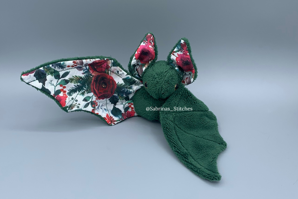 
            
                Load image into Gallery viewer, Christmas Floral Bat
            
        
