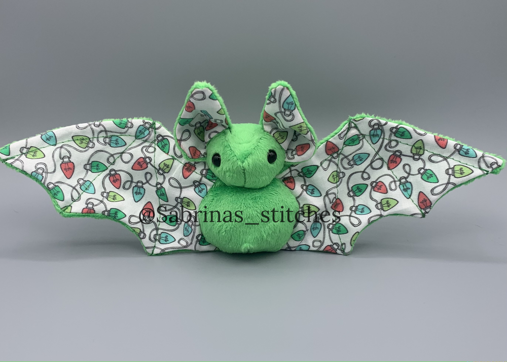 
            
                Load image into Gallery viewer, Holiday Bat
            
        